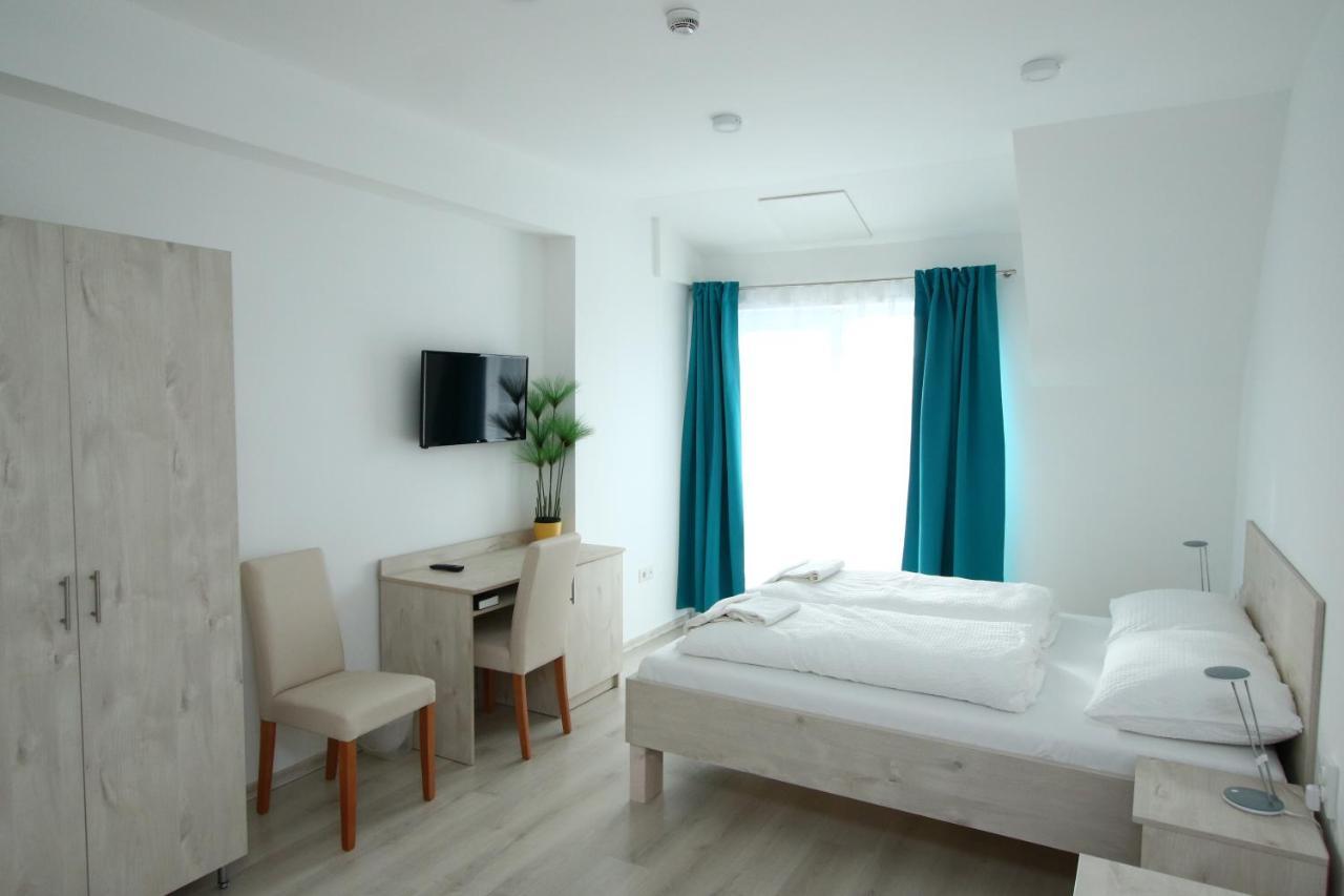 Hotel Aqua โคมารม ภายนอก รูปภาพ